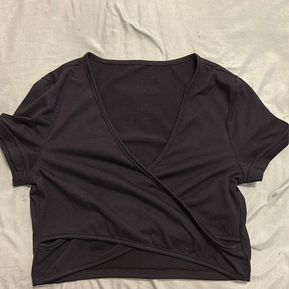 Size S but runs smaller. Never worn. $7 OBO ☺️